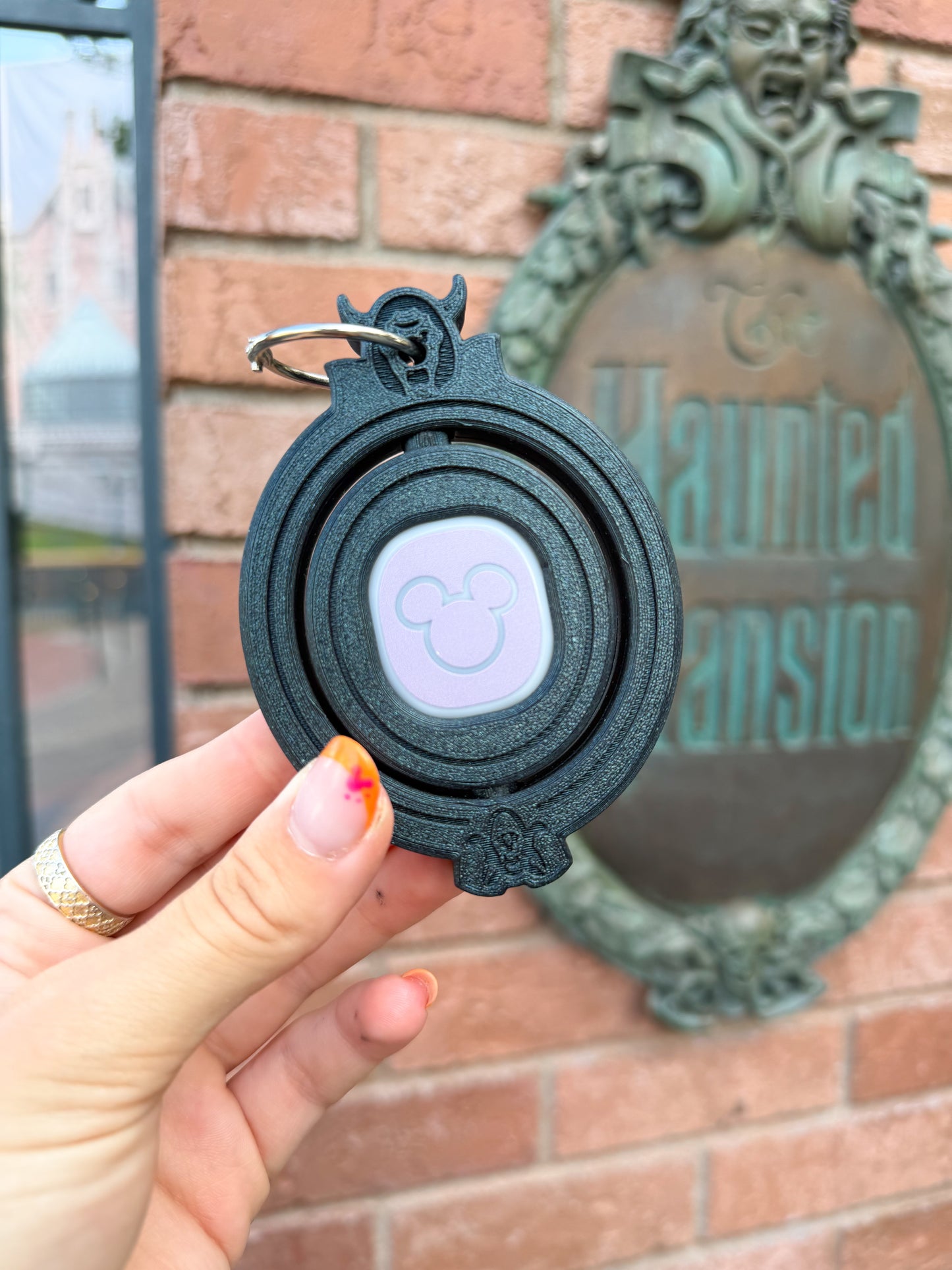 Spinning Haunted Mansion Magic Band Buddy