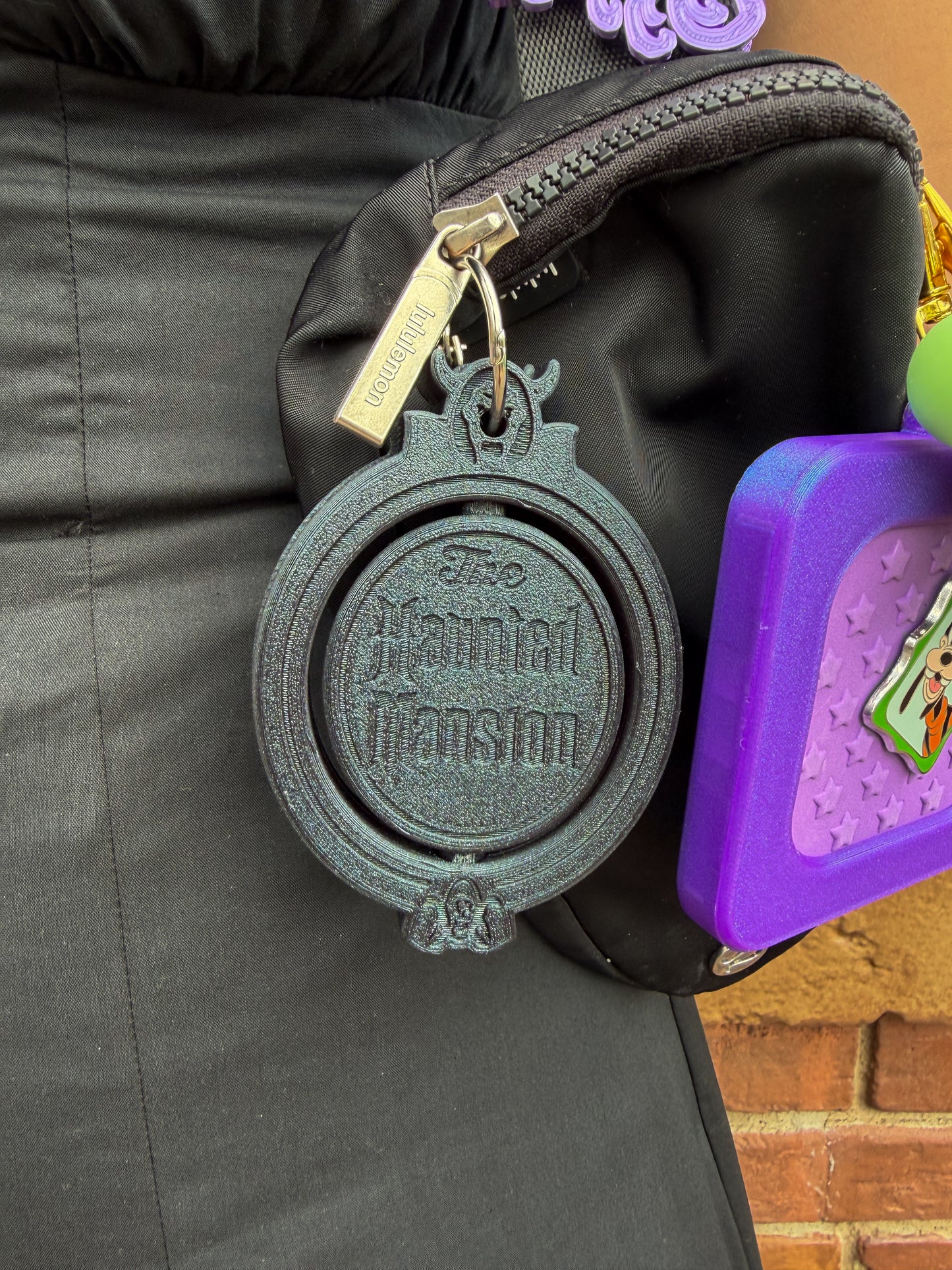 Spinning Haunted Mansion Magic Band Buddy