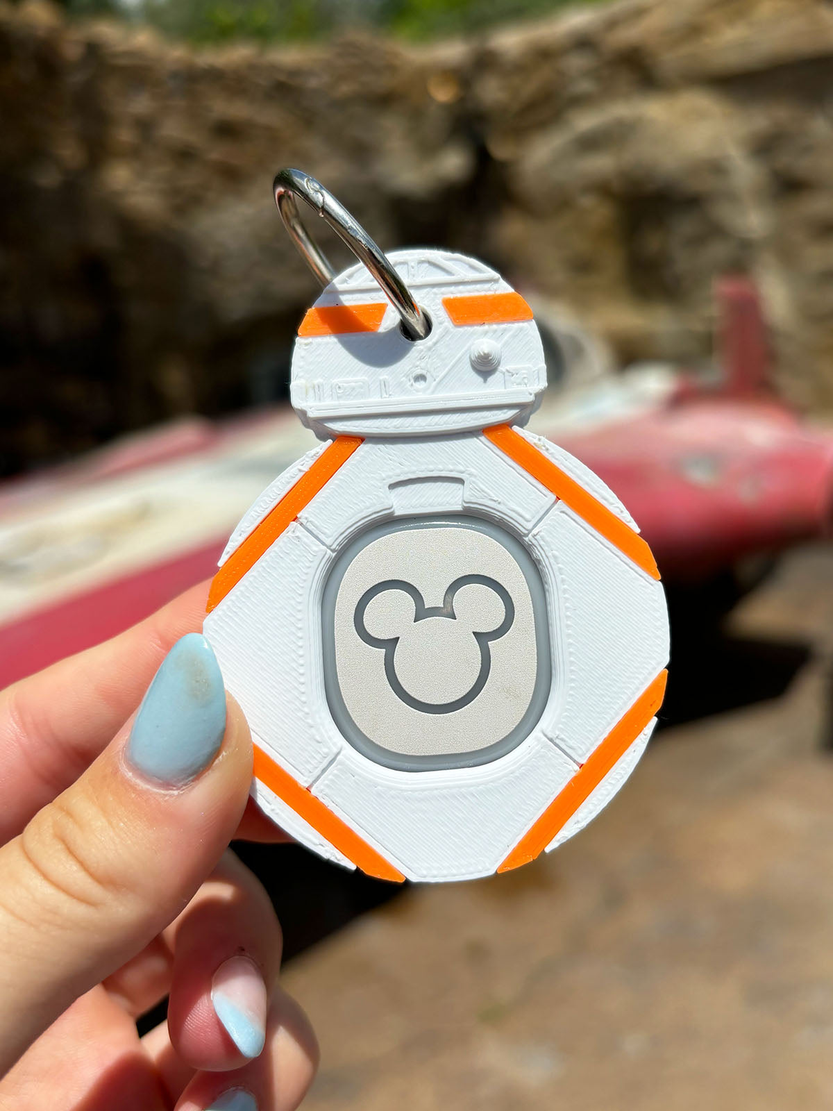 Spherical Orange Robot Magic Band Buddy