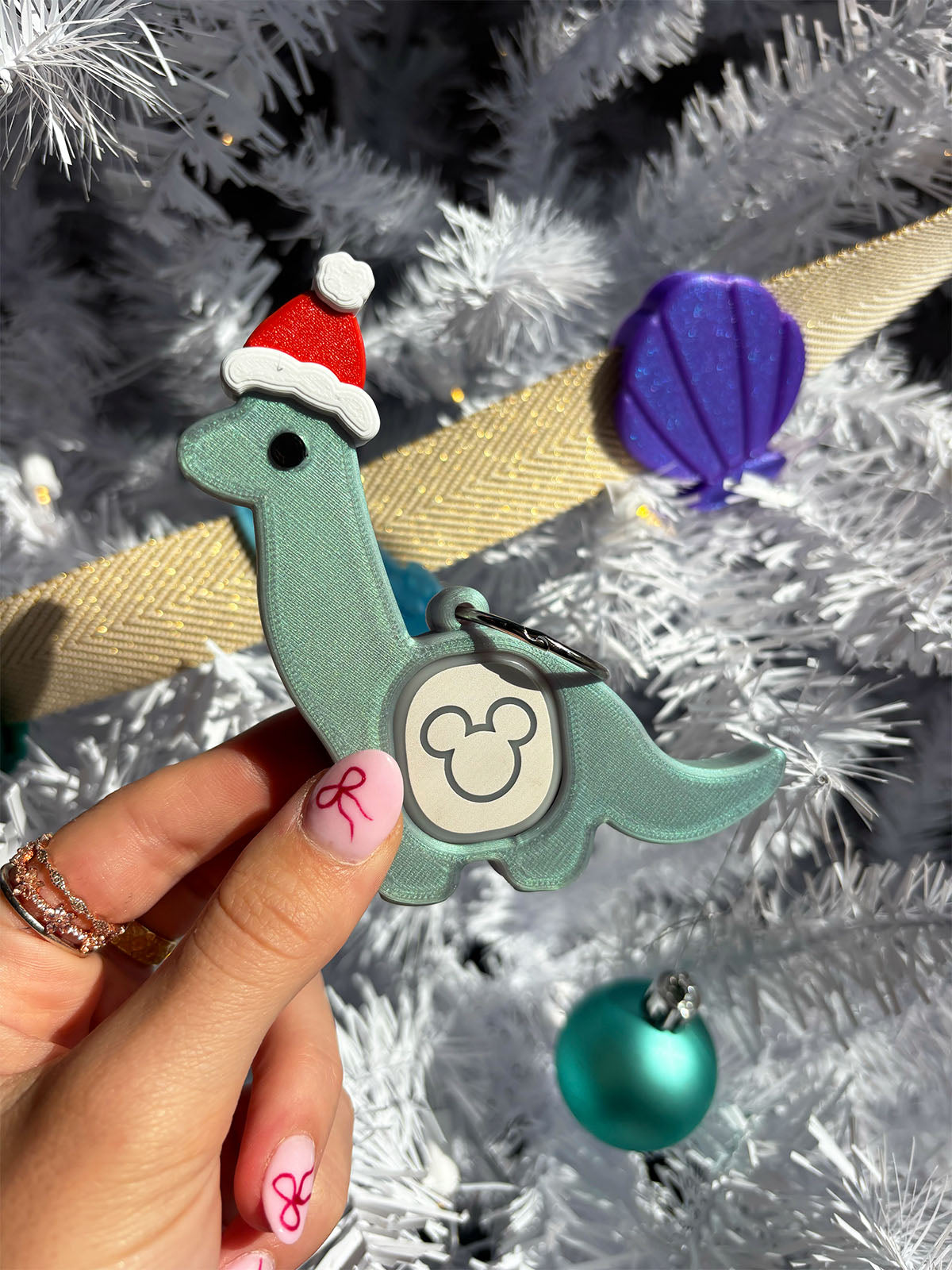Santa Dinosaur Magic Band Buddy